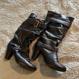 Target, below the knee, black heeled boots with strap and buckle accent. Size 10